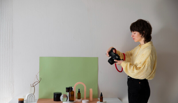 medium-shot-specialized-photographer-taking-photos